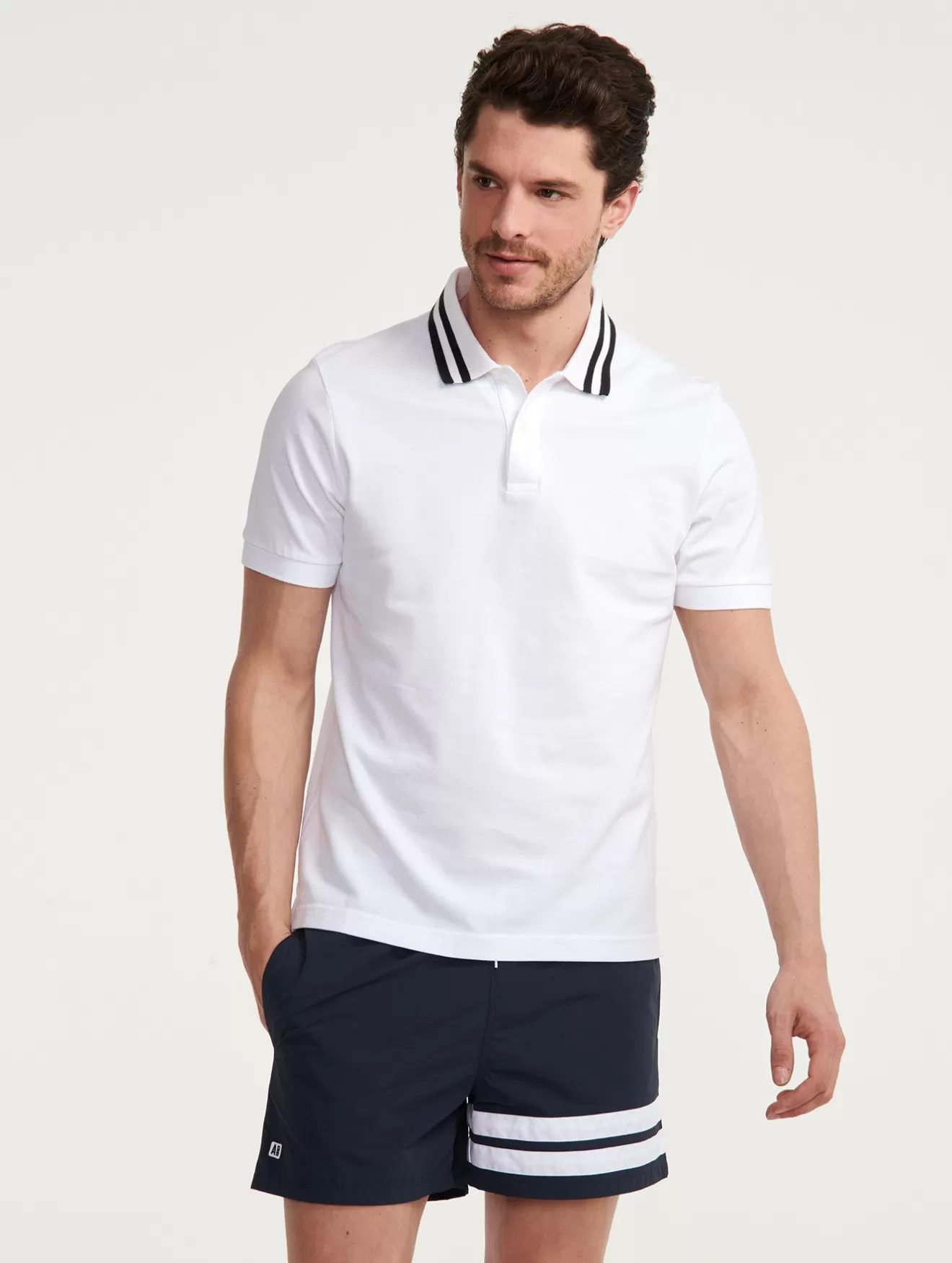 Store Aigle Polo Double Bandes Au Col A Manches Courtes Blanc Aigle